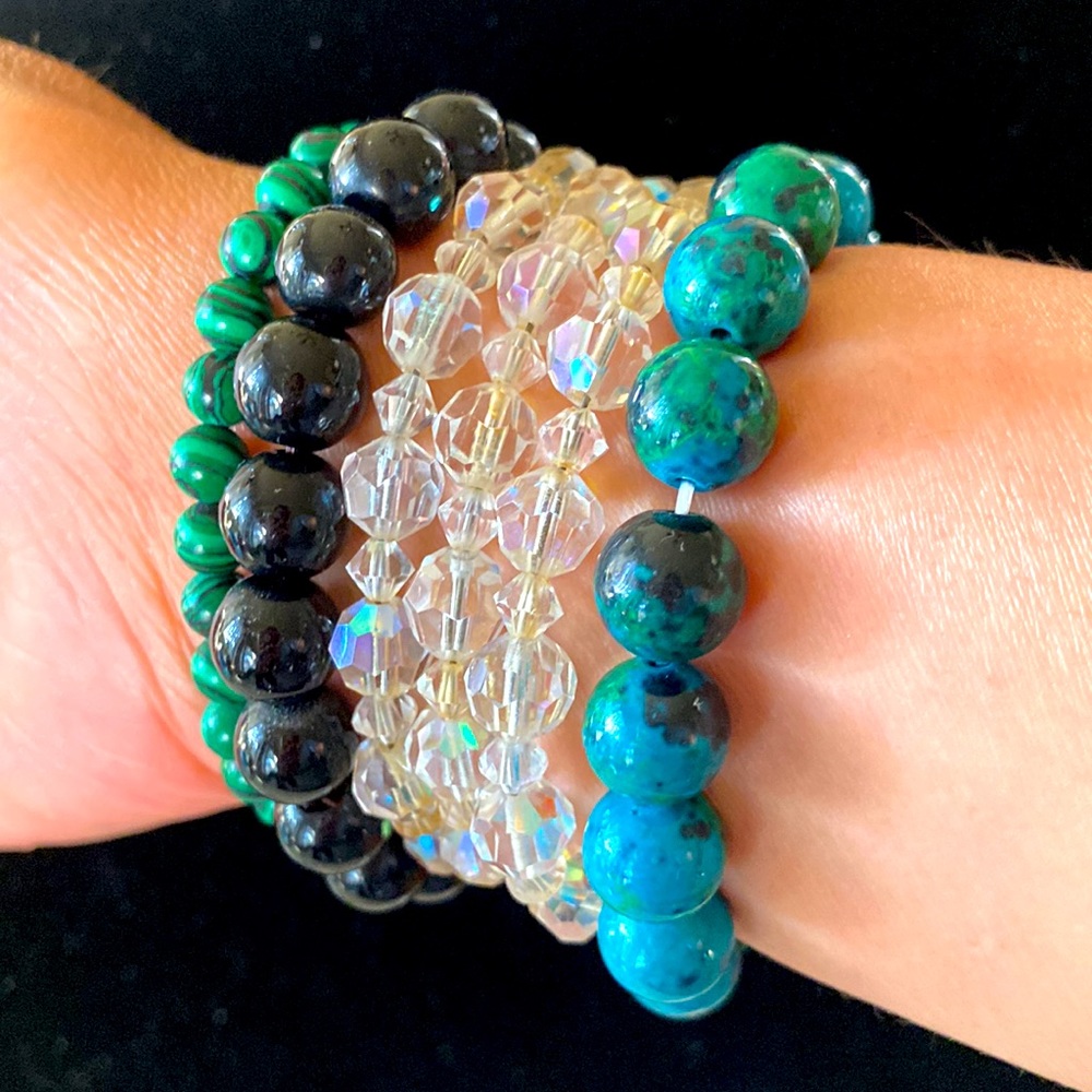 4 bracelets.  Vintage crystal and Genuine stones.